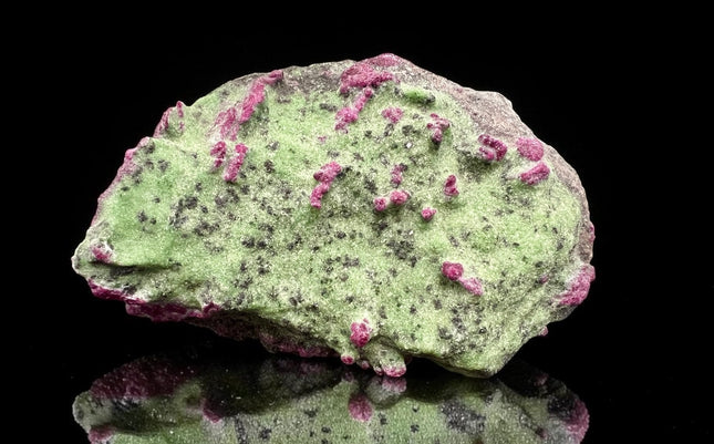 Collector's grade 2,230 gram Ruby in Zoisite featuring vibrant low-iron raw ruby crystal clusters within natural green zoisite matrix displayed as a one-of-a-kind mineral specimen.