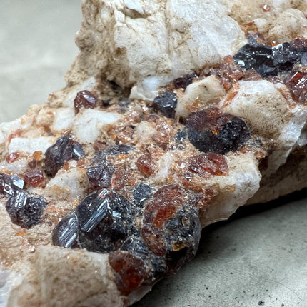 Natural Spessartine Garnet crystal specimen from Pakistan weighing 152 grams with vibrant orange garnet crystals, Raven's Cauldron, Delaware, OH.