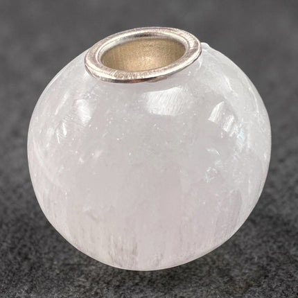 Selenite sphere chime candle holder polished crystal 0.5 inch candle opening energy cleansing decor, from Raven's Cauldron, 6 N Sandusky St, Delaware, OH 43015