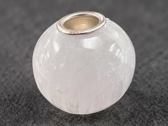 Selenite sphere chime candle holder polished crystal 0.5 inch candle opening energy cleansing decor, from Raven's Cauldron, 6 N Sandusky St, Delaware, OH 43015