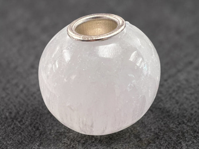Selenite sphere chime candle holder polished crystal 0.5 inch candle opening energy cleansing decor, from Raven's Cauldron, 6 N Sandusky St, Delaware, OH 43015