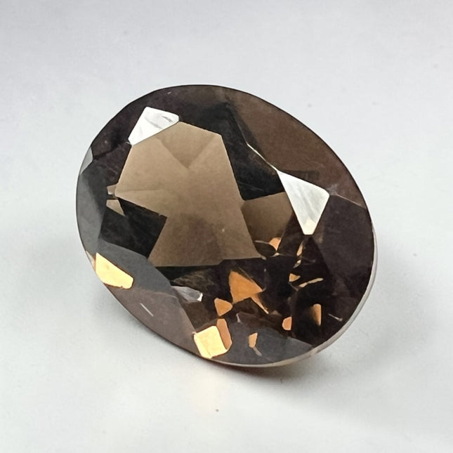 Natural Smoky Quartz faceted loose gemstone, 9x7mm oval, undrilled jewelry stone with rich smoky brown color for custom jewelry making, Raven's Cauldron, Delaware, OH