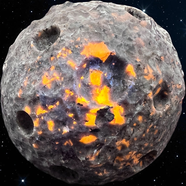 Yooperlite Moon Sphere 3.5 inches glowing under UV light – Raven’s Cauldron 6 N Sandusky St. Delaware, OH 43015