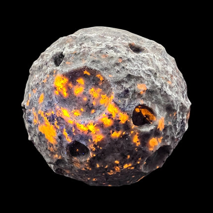 Yooperlite Moon Sphere 3.5 inches glowing under UV light – Raven’s Cauldron 6 N Sandusky St. Delaware, OH 43015