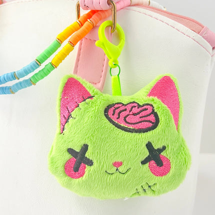 Creepy cute kawaii zombie cat plush bag charm keychain by Kawaii Hair Candy-shown on bag
