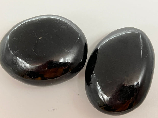 Black Tourmaline palm stone - Raven's Cauldron