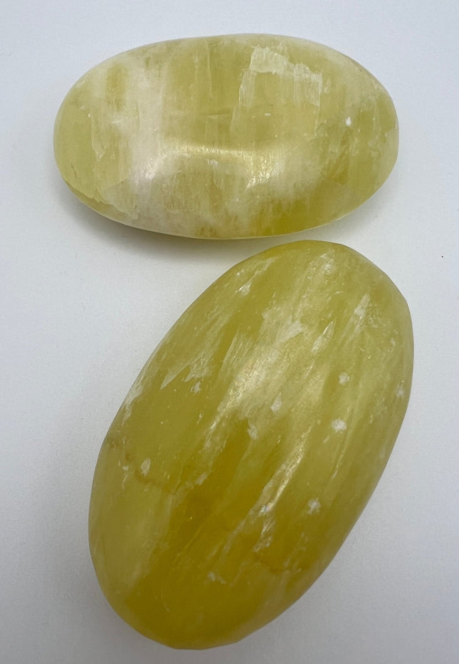 Pineapple Calcite Palm Stone - Raven's Cauldron