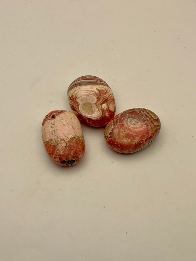 Rhodochrosite Palm Stone - Raven's Cauldron