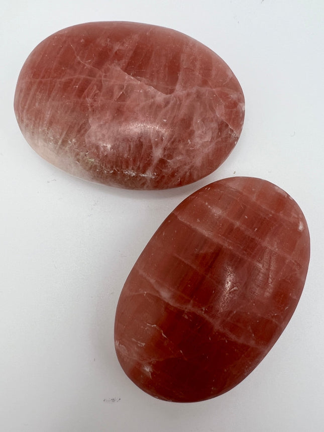 Strawberry Calcite Palm Stone - Raven's Cauldron