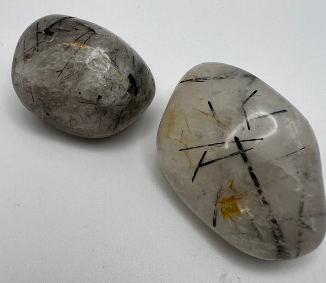 Tourmalinated Quartz palm stone - Raven's Cauldron